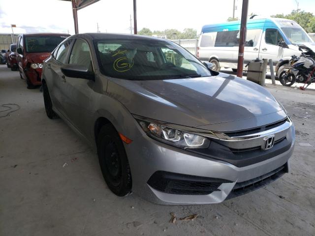 HONDA CIVIC LX 2018 with VIN 19XFC2F56JE022903 - Photo from auction
