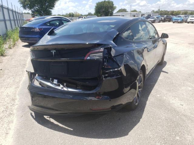 Photo 4 from auction – 2021 TESLA MODEL 3 with VIN 5YJ3E1EA5MF087505