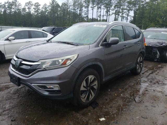 Photo 2 from auction – 2015 HONDA CR-V TOURI with VIN 5J6RM4H92FL099069