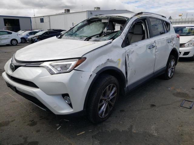 Photo 2 from auction – 2017 TOYOTA RAV4 LIMIT with VIN 2T3DFREV0HW609881