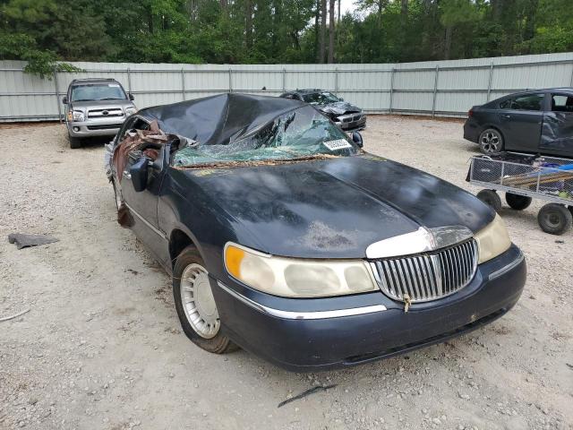 LINCOLN TOWN CAR E 2000 with VIN 1LNHM81W9YY886921 - Photo from auction
