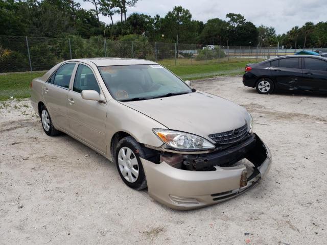TOYOTA CAMRY LE 2002 with VIN 4T1BE32K12U560594 - Photo from auction
