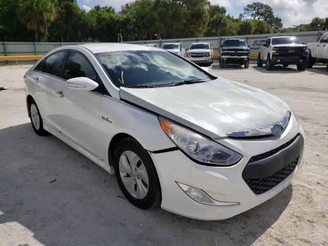 HYUNDAI SONATA HYB 2015 with VIN KMHEC4A4XFA138634 - Photo from auction