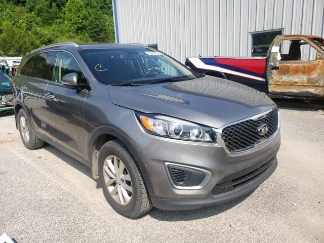 KIA SORENTO LX 2016 with VIN 5XYPG4A32GG107128 - Photo from auction