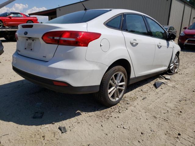 Photo 4 from auction – 2016 FORD FOCUS SE with VIN 1FADP3F21GL397644