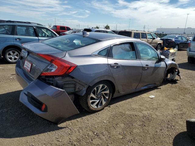 Photo 4 from auction – 2018 HONDA CIVIC EX with VIN 19XFC2F71JE033437