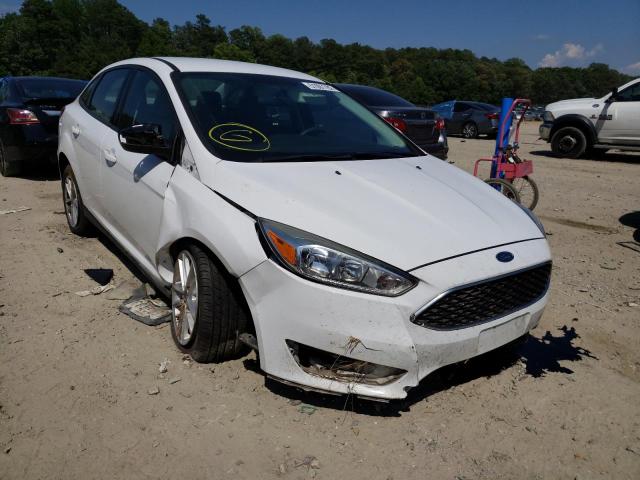 FORD FOCUS SE 2016 with VIN 1FADP3F21GL397644 - Photo from auction