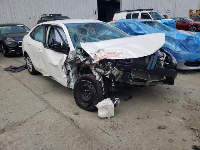 TOYOTA COROLLA L 2018 with VIN 5YFBURHE0JP849957 - Photo from auction
