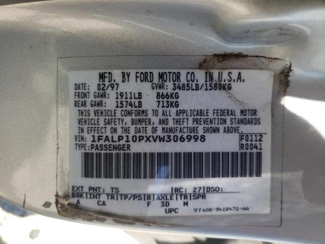 Photo 10 from auction – 1997 FORD ESCORT with VIN 1FALP10PXVW306998