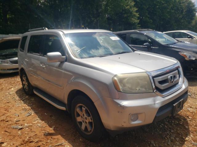HONDA PILOT TOUR 2010 with VIN 5FNYF3H97AB018438 - Photo from auction