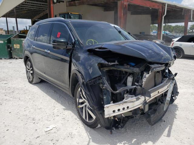 HONDA PILOT TOUR 2016 with VIN 5FNYF5H94GB005814 - Photo from auction