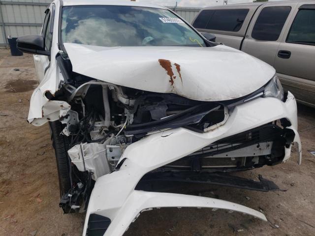 Photo 9 from auction – 2018 TOYOTA RAV4 LE with VIN 2T3ZFREV9JW494726