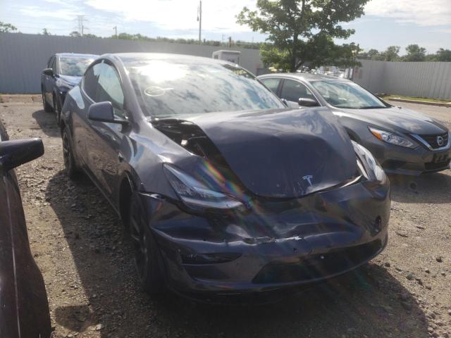 TESLA MODEL Y 2022 with VIN 7SAYGDEE5NF386078 - Photo from auction
