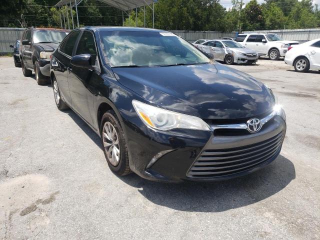 TOYOTA CAMRY LE 2017 with VIN 4T1BF1FK4HU698263 - Photo from auction