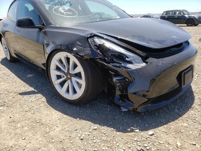 Photo 9 from auction – 2022 TESLA MODEL 3 with VIN 5YJ3E1EA5NF190487