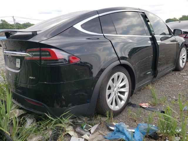 Photo 4 from auction – 2016 TESLA MODEL X with VIN 5YJXCAE20GF003272