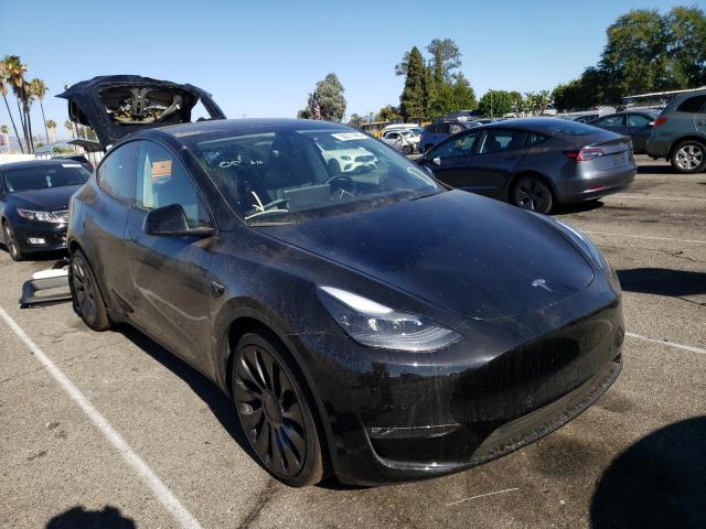TESLA MODEL Y 2022 with VIN 7SAYGDEF4NF409195 - Photo from auction
