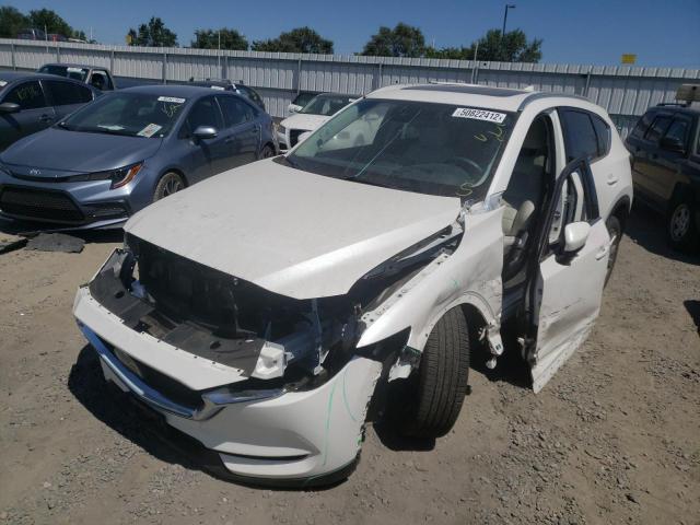 Photo 2 from auction – 2021 MAZDA CX-5 GRAND with VIN JM3KFBDM9M1430309