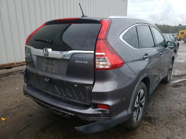 Photo 4 from auction – 2015 HONDA CR-V TOURI with VIN 5J6RM4H92FL099069