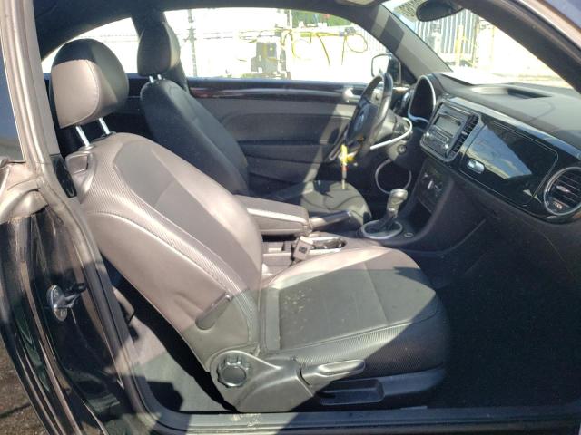 Photo 5 from auction – 2014 VOLKSWAGEN BEETLE with VIN 3VWJ07AT1EM660698