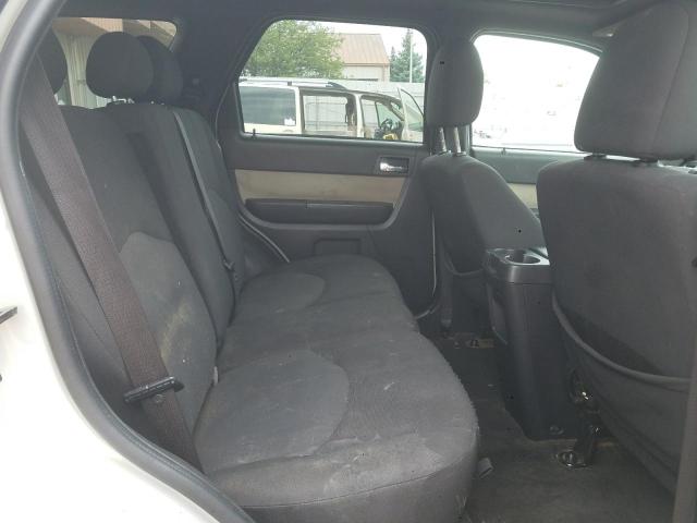 Photo 6 from auction – 2009 MERCURY MARINER with VIN 4M2CU81789KJ07515