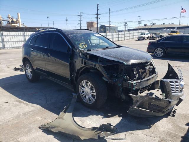 CADILLAC SRX 2014 with VIN 3GYFNAE33ES688297 - Photo from auction