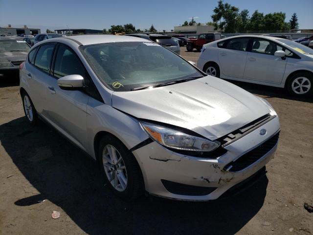 FORD FOCUS SE 2015 with VIN 1FADP3K21FL288623 - Photo from auction