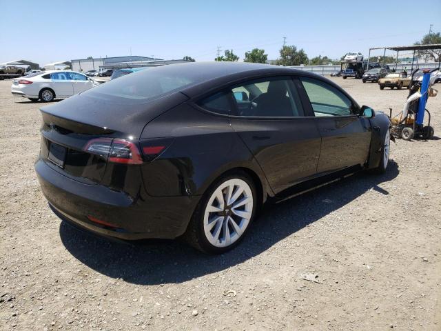 Photo 4 from auction – 2022 TESLA MODEL 3 with VIN 5YJ3E1EA5NF190487