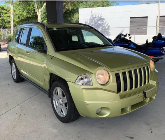 JEEP COMPASS SP 2010 with VIN 1J4NT4FAXAD504709 - Photo from auction