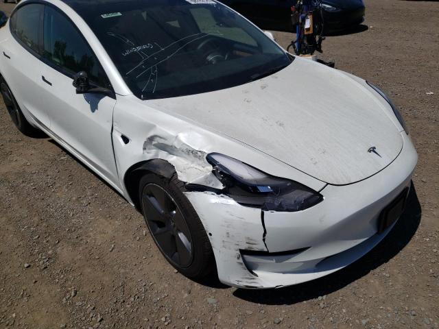 Photo 9 from auction – 2022 TESLA MODEL 3 with VIN 5YJ3E1EB0NF190972
