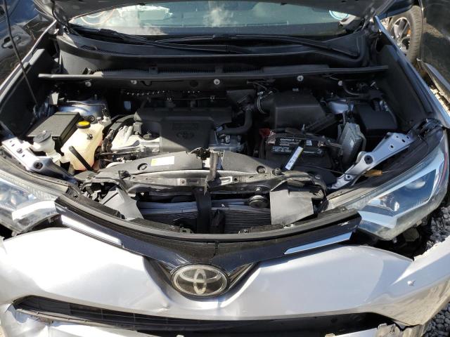 Photo 7 from auction – 2018 TOYOTA RAV4 LE with VIN 2T3ZFREVXJW407206