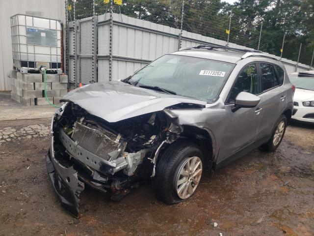 Photo 2 from auction – 2014 MAZDA CX-5 TOURI with VIN JM3KE2CY0E0427765