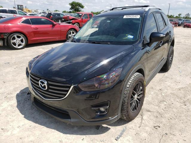 Photo 2 from auction – 2016 MAZDA CX-5 SPORT with VIN JM3KE2BE7G0645499