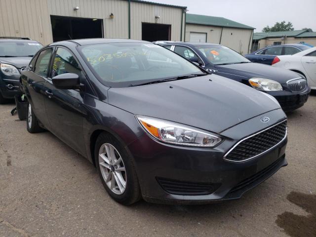 FORD FOCUS SE 2018 with VIN 1FADP3F25JL309427 - Photo from auction