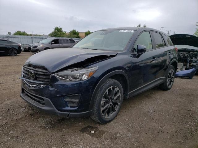 Photo 2 from auction – 2016 MAZDA CX-5 GT with VIN JM3KE4DYXG0743364