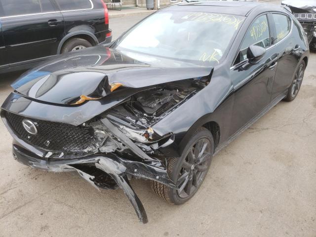 Photo 2 from auction – 2021 MAZDA 3 PREMIUM with VIN JM1BPBNY4M1347491