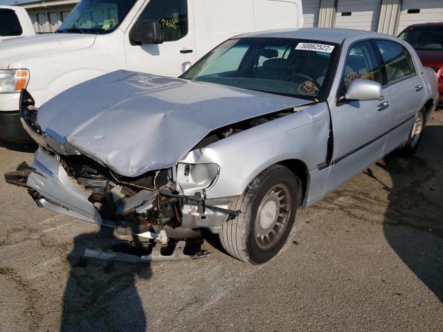 Photo 2 from auction – 2001 LINCOLN TOWN CAR E with VIN 1LNHM81W71Y607875