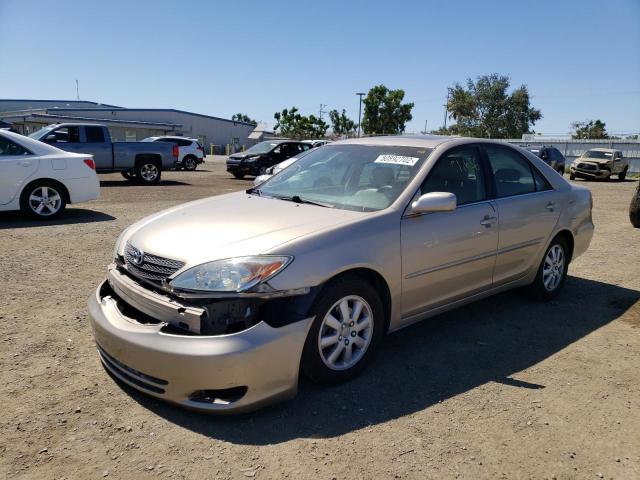 Photo 2 from auction – 2002 TOYOTA CAMRY LE with VIN JTDBF30K520067979