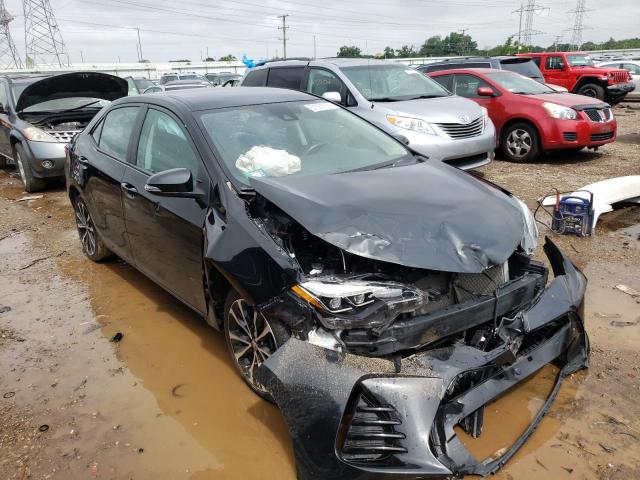 TOYOTA COROLLA L 2017 with VIN 5YFBURHE2HP687792 - Photo from auction