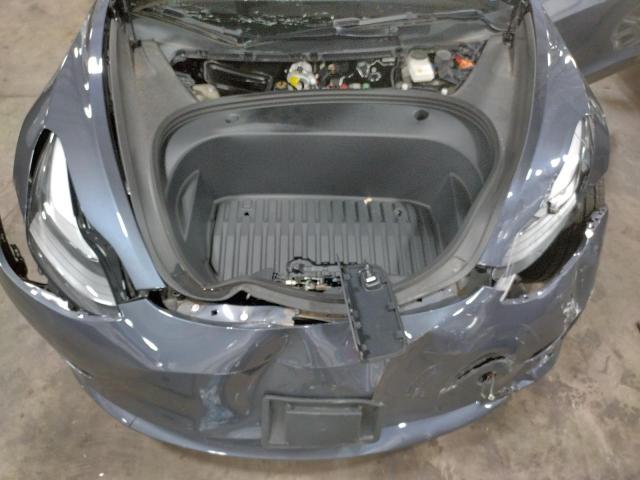 Photo 7 from auction – 2022 TESLA MODEL 3 with VIN 5YJ3E1EB8NF185468