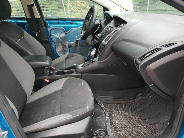 Foto 5 de la subasta – 2014 FORD FOCUS SE con VIN 1FADP3F21EL258479