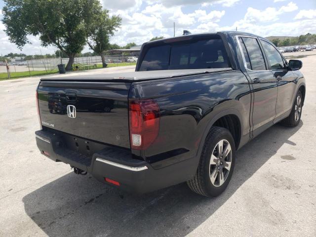 Photo 4 from auction – 2019 HONDA RIDGELINE with VIN 5FPYK2F58KB008371