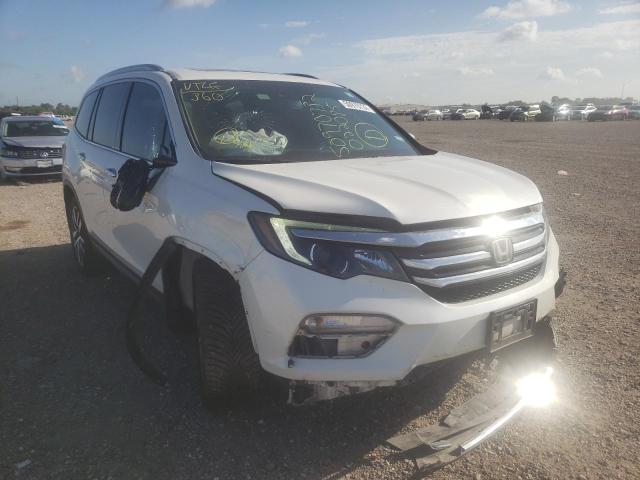HONDA PILOT TOUR 2016 with VIN 5FNYF5H95GB022086 - Photo from auction