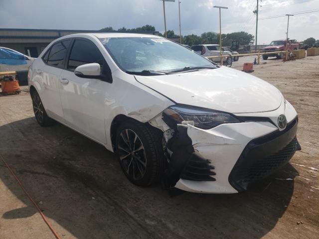 TOYOTA COROLLA L 2017 with VIN 2T1BURHEXHC828477 - Photo from auction