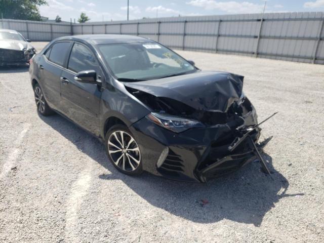 TOYOTA COROLLA L 2018 with VIN 5YFBURHE2JP780964 - Photo from auction