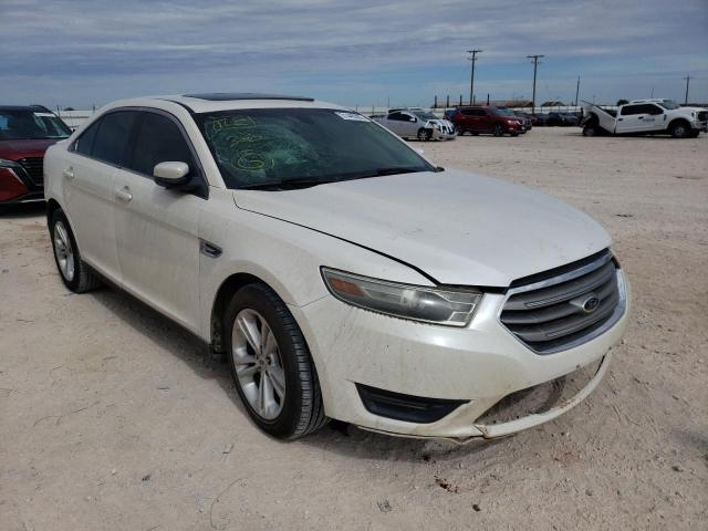 FORD TAURUS SEL 2014 with VIN 1FAHP2E87EG131407 - Photo from auction