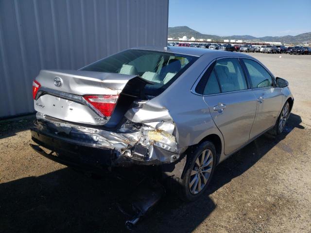Photo 4 from auction – 2016 TOYOTA CAMRY HYBR with VIN 4T1BF1FK8GU520273