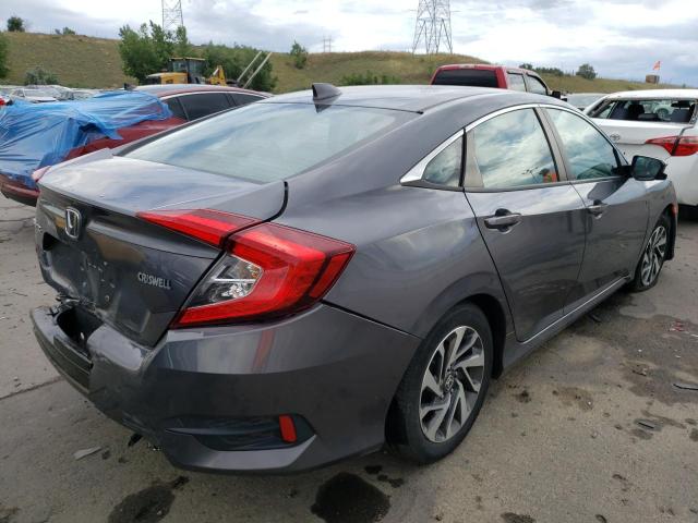 Photo 4 from auction – 2018 HONDA CIVIC EX with VIN 2HGFC2F74JH600004