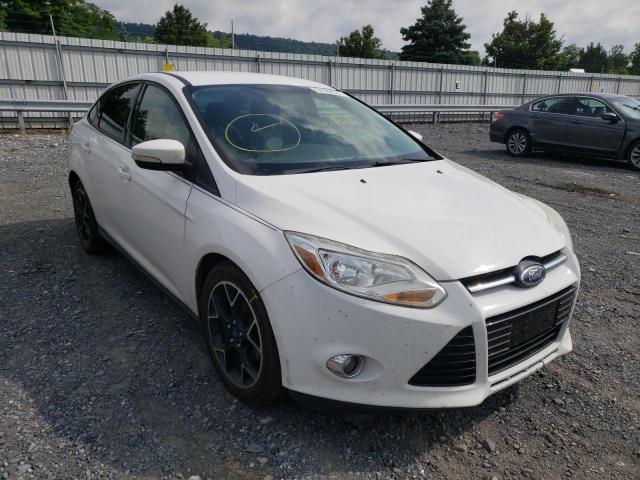 FORD FOCUS SE 2012 with VIN 1FAHP3F21CL322924 - Photo from auction