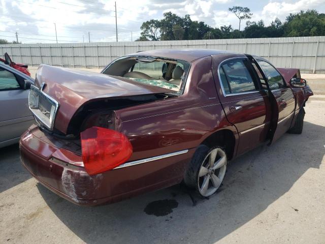 Photo 4 from auction – 2003 LINCOLN TOWN CAR E with VIN 1LNHM81W13Y660848